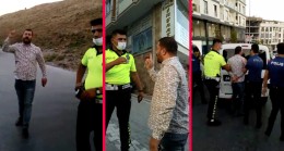 Minibüs şoförü, parmak sallayarak polisleri ölümle tehdit ediyor!